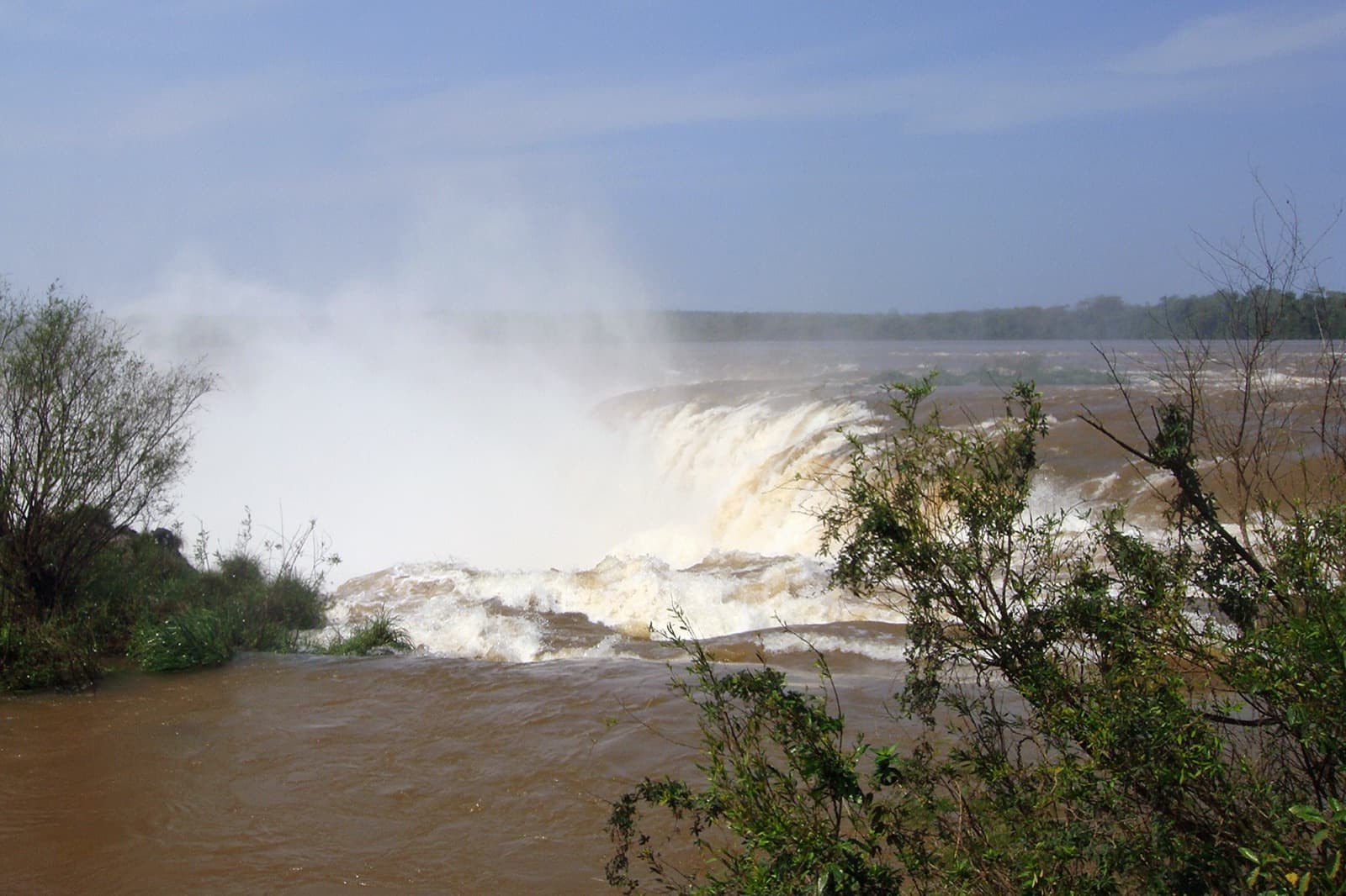 The Iguazu River pouring into the Devil's Throat, seen from the Argentine catwalks near the balcony viewpoint